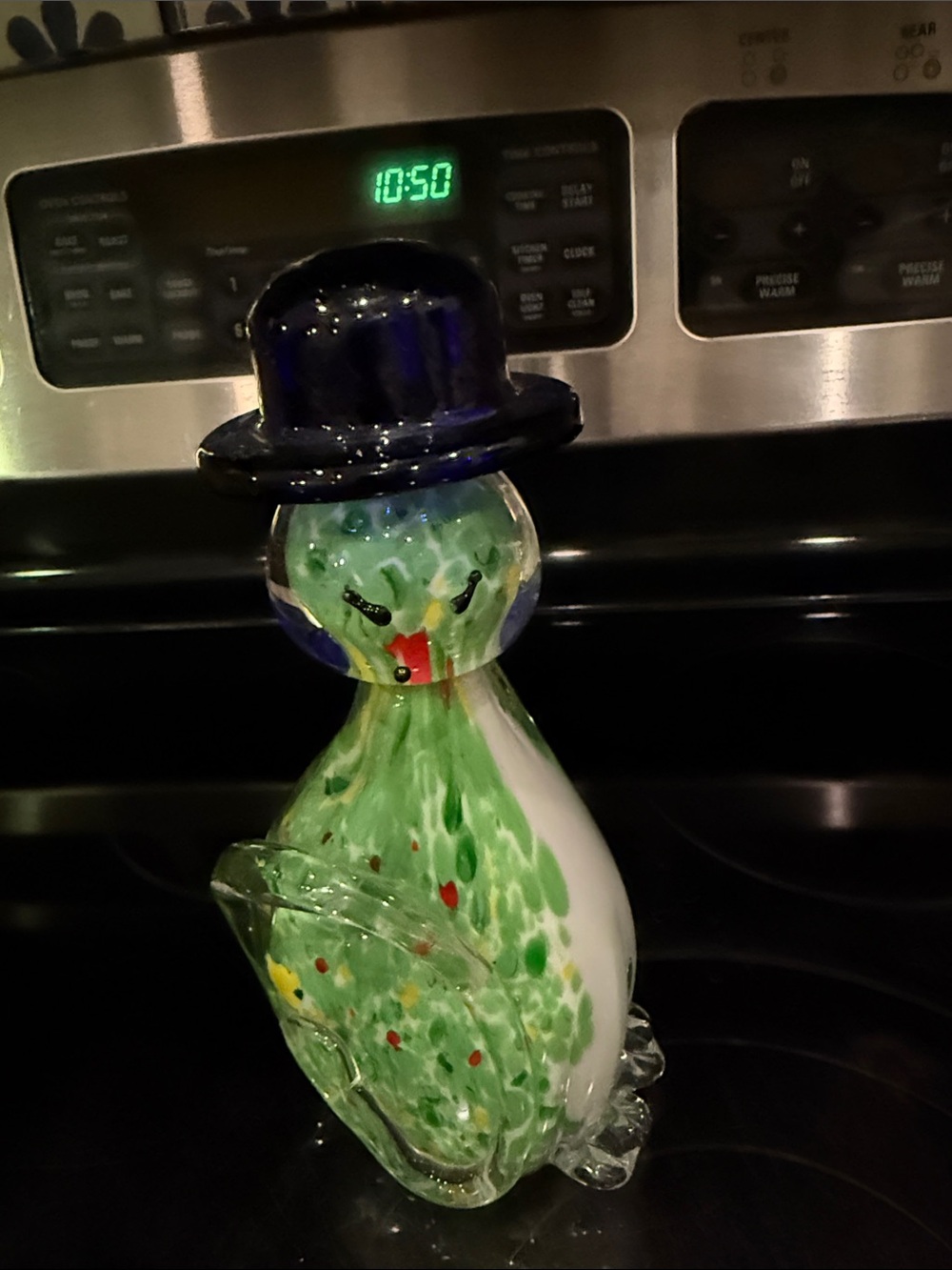 Hand-Blown Glass Figurine in Green with Dark Blue Hat